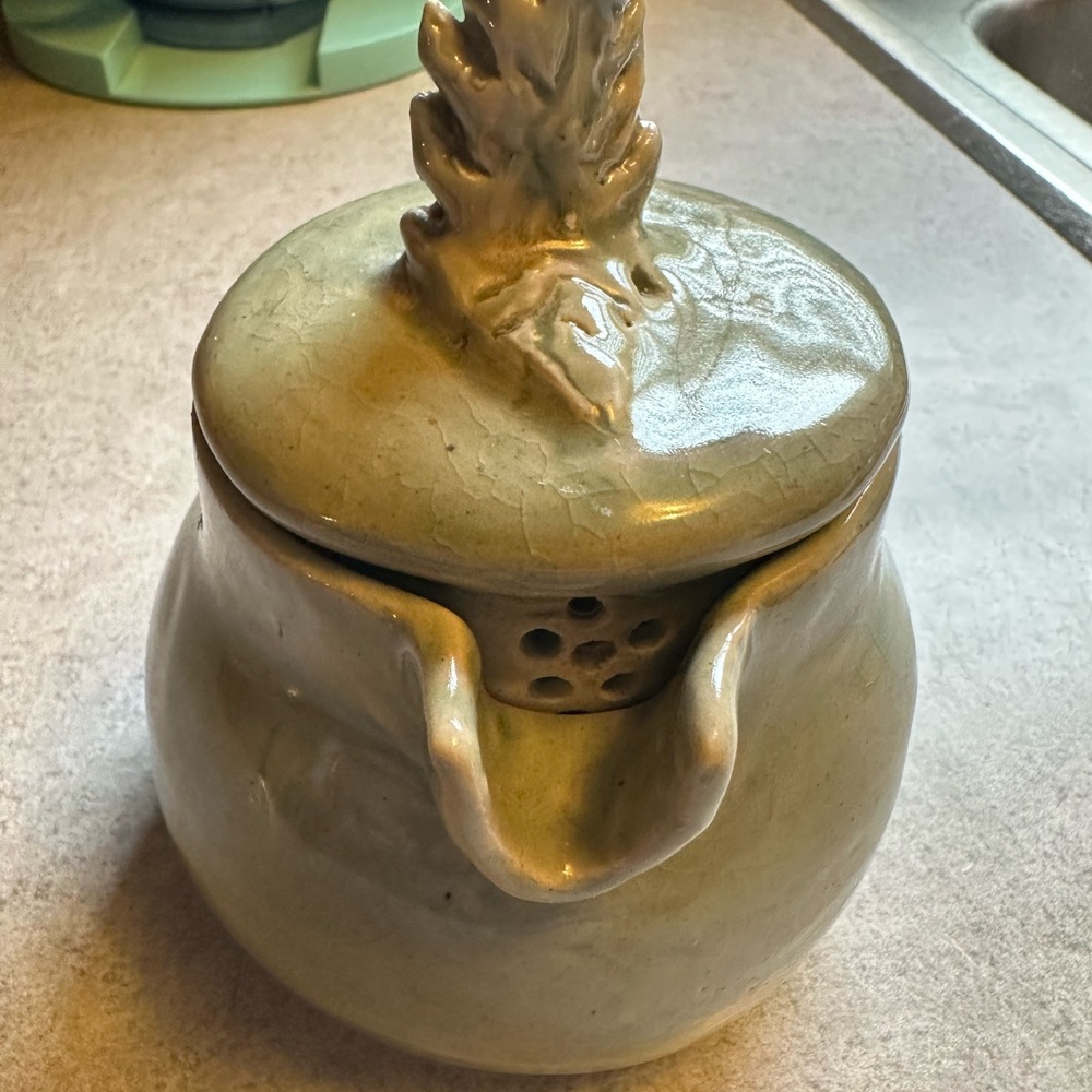 Artisan Ceramic Jar with Leaf Motif